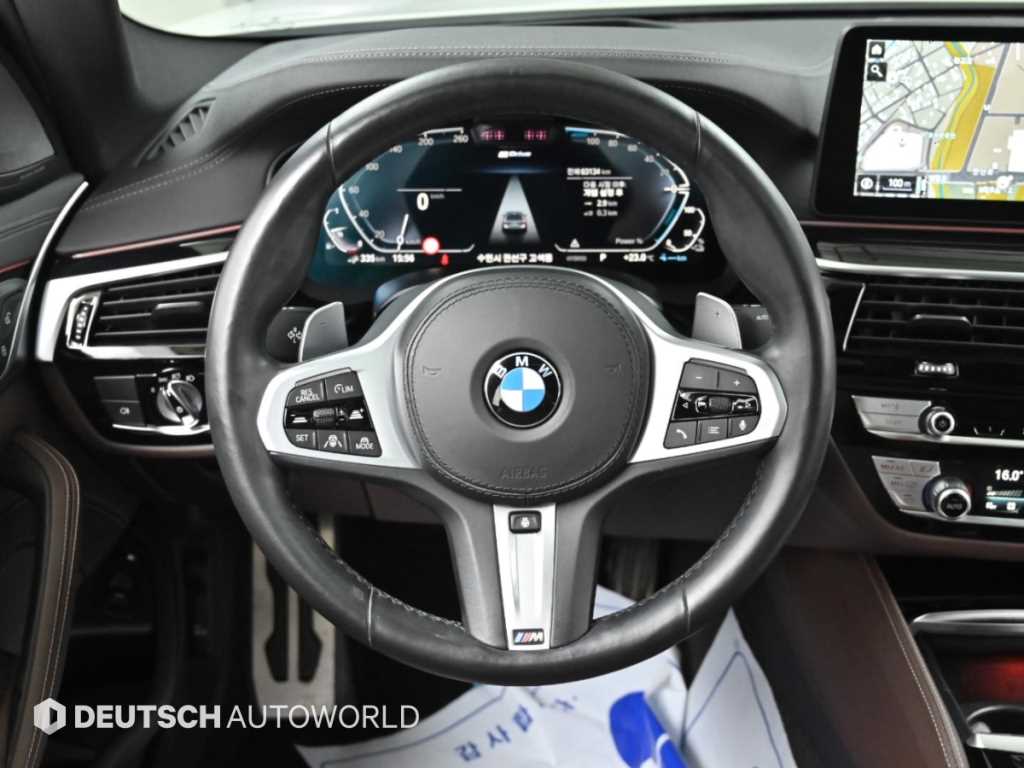 BMW 5-Series — photo 13