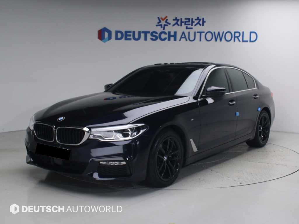 BMW 5-Series — photo 01
