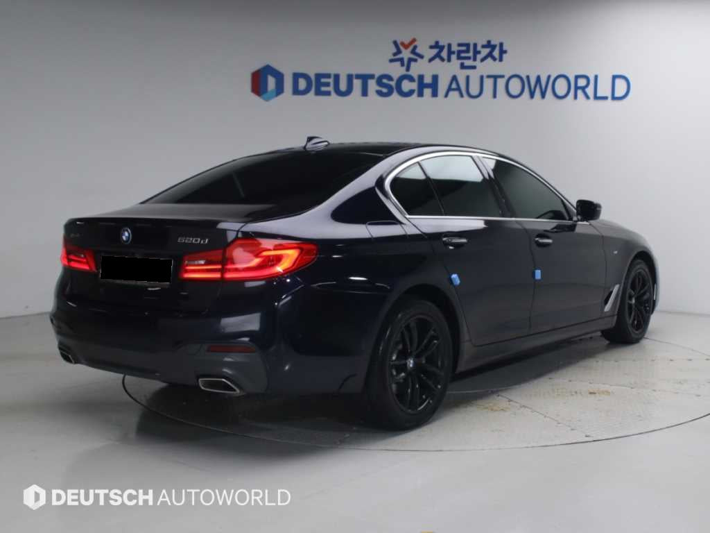 BMW 5-Series — photo 02