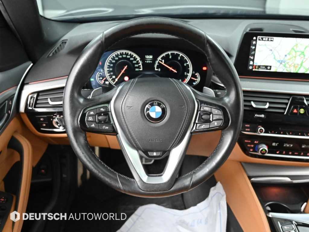 BMW 5-Series — photo 13