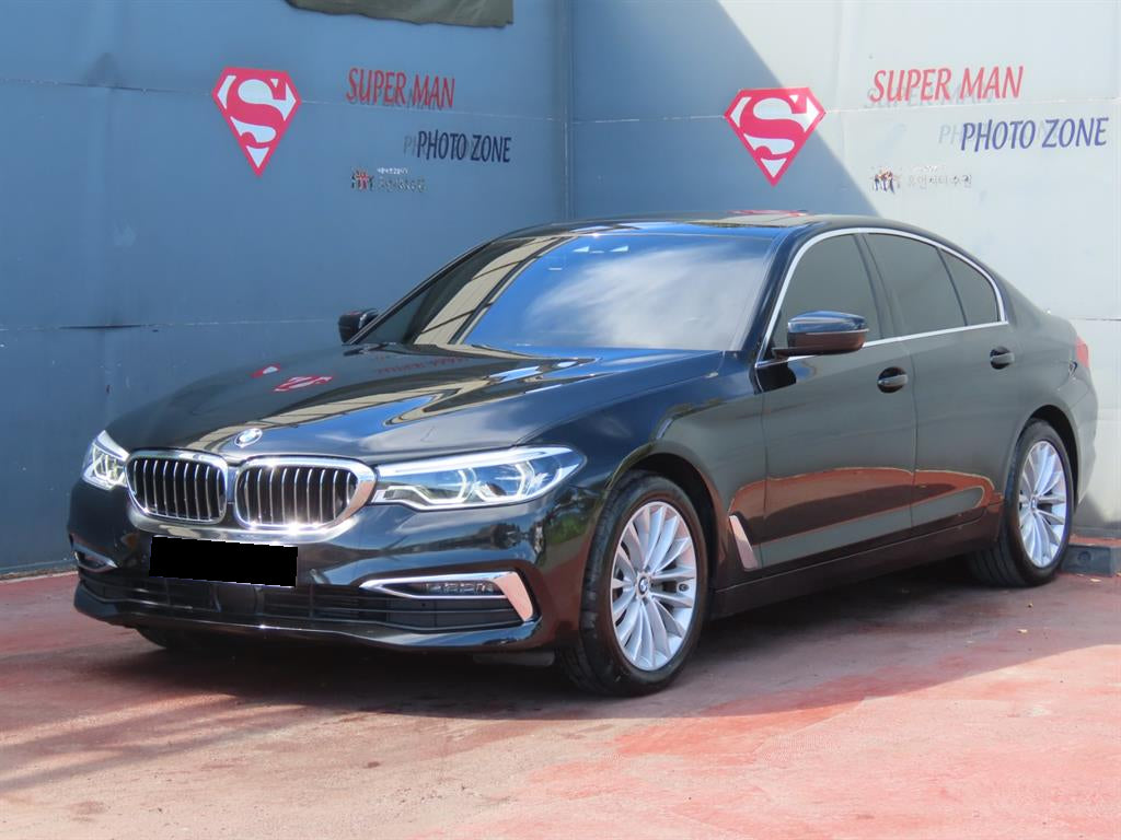 BMW 5-Series — photo 01