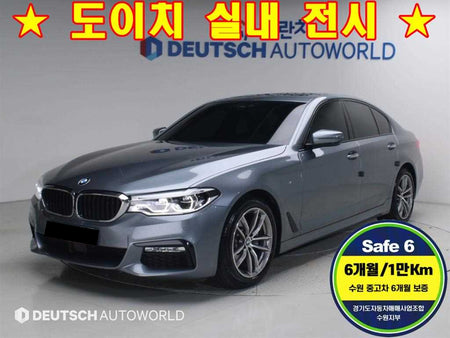 BMW 5-Series — photo 01
