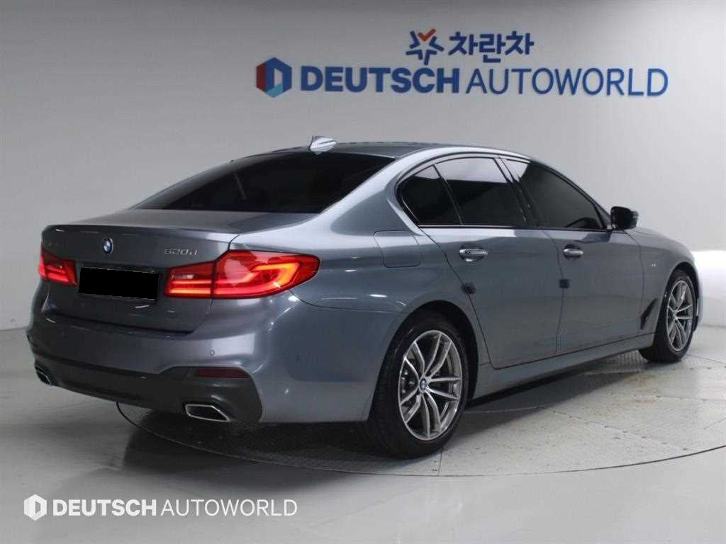 BMW 5-Series — photo 02