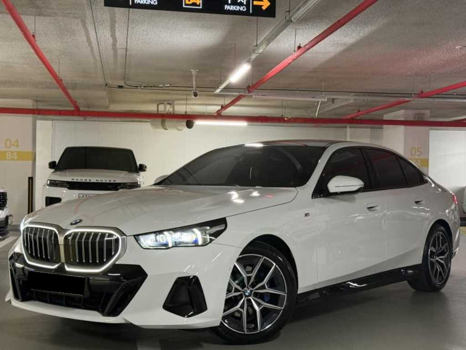 BMW 5-Series — photo 01
