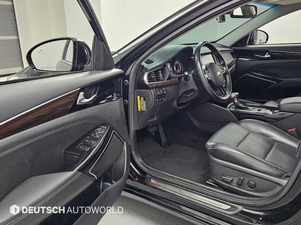Kia K7 — photo 11