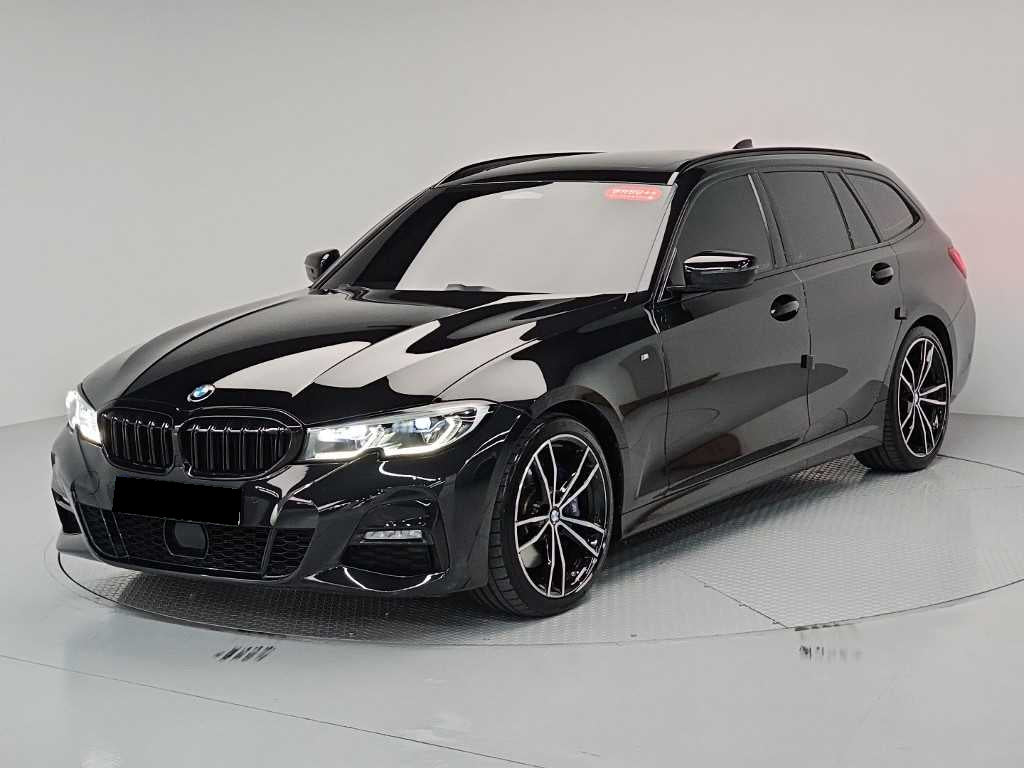 BMW 3-Series — photo 01