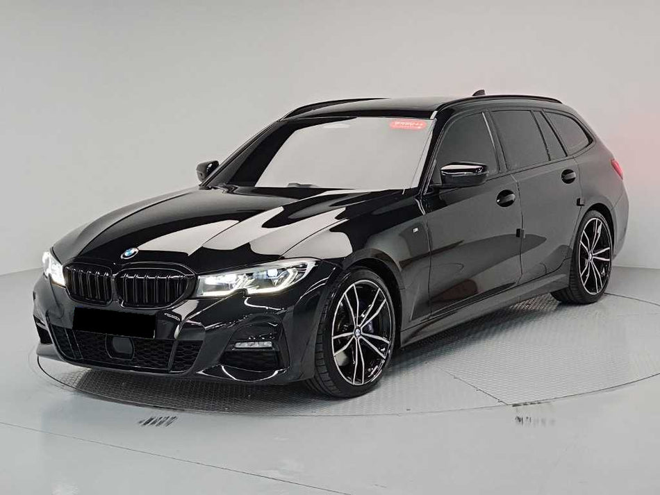 BMW 3-Series — photo 01