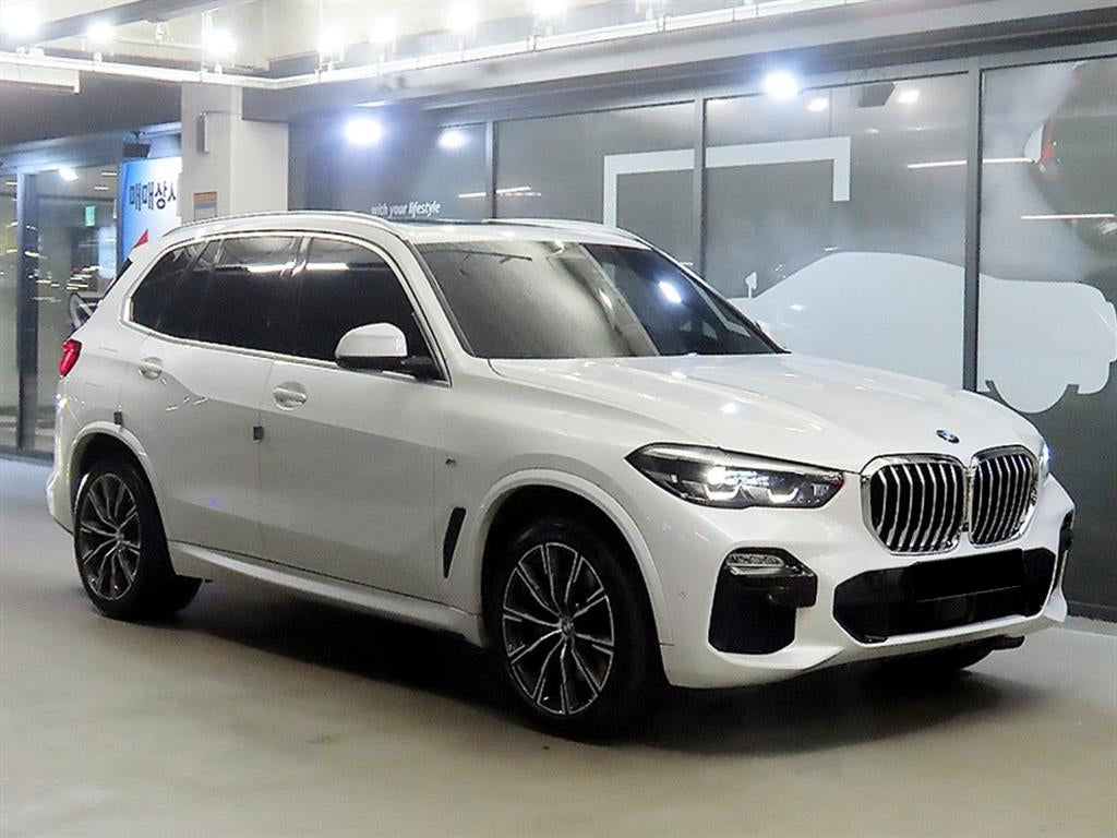 BMW X5 — photo 01