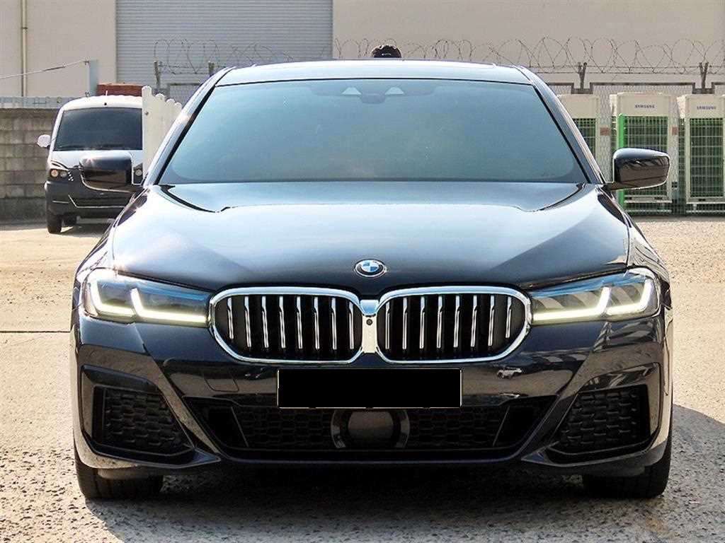 BMW 5-Series — photo 01