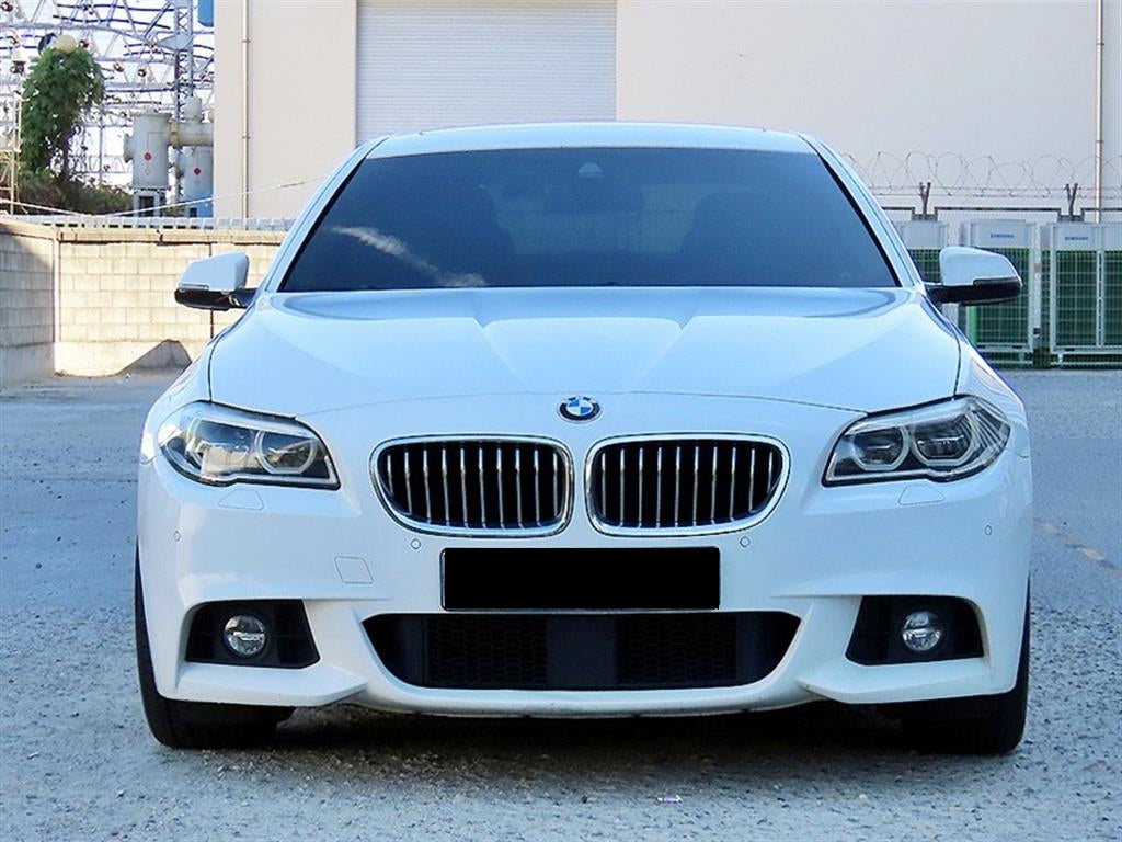 BMW 5-Series — photo 01