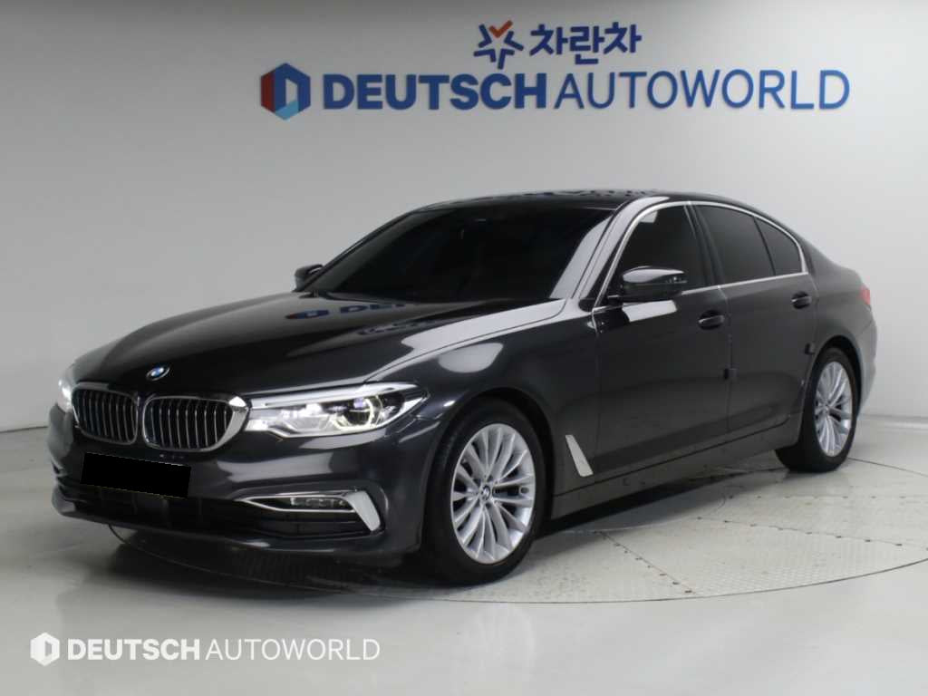 BMW 5-Series — photo 01