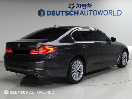 BMW 5-Series — photo 02