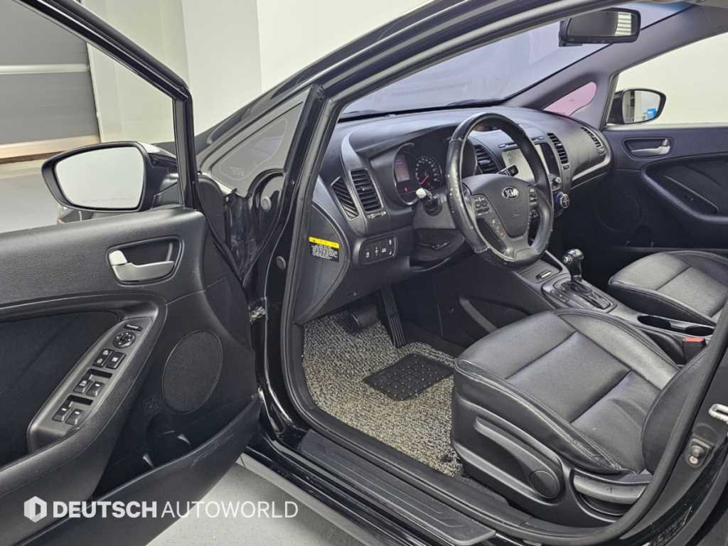 Kia K3 — photo 11
