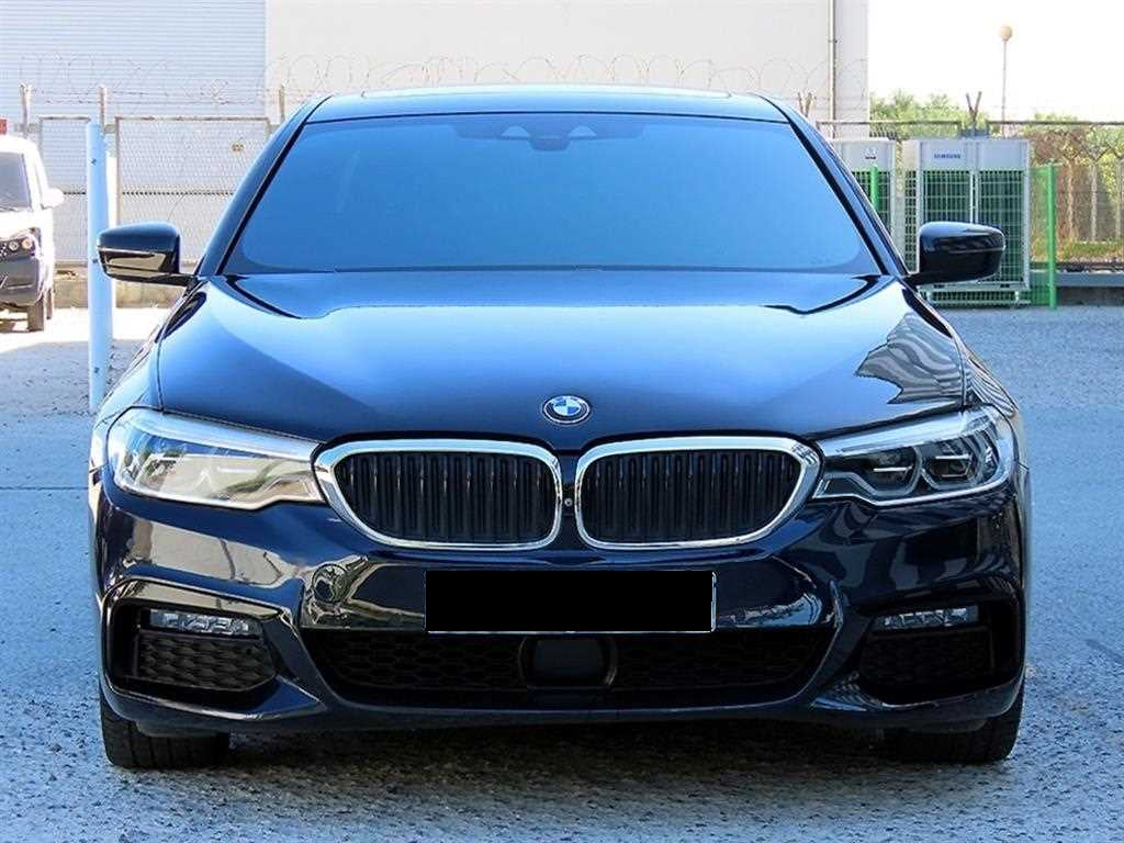 BMW 5-Series — photo 01