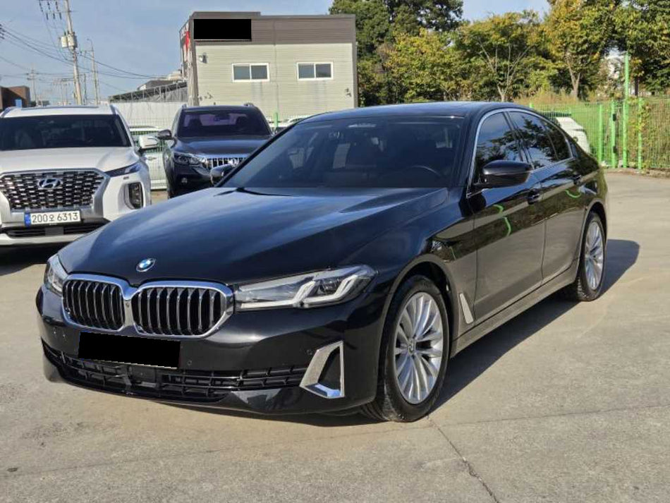 BMW 5-Series — photo 01