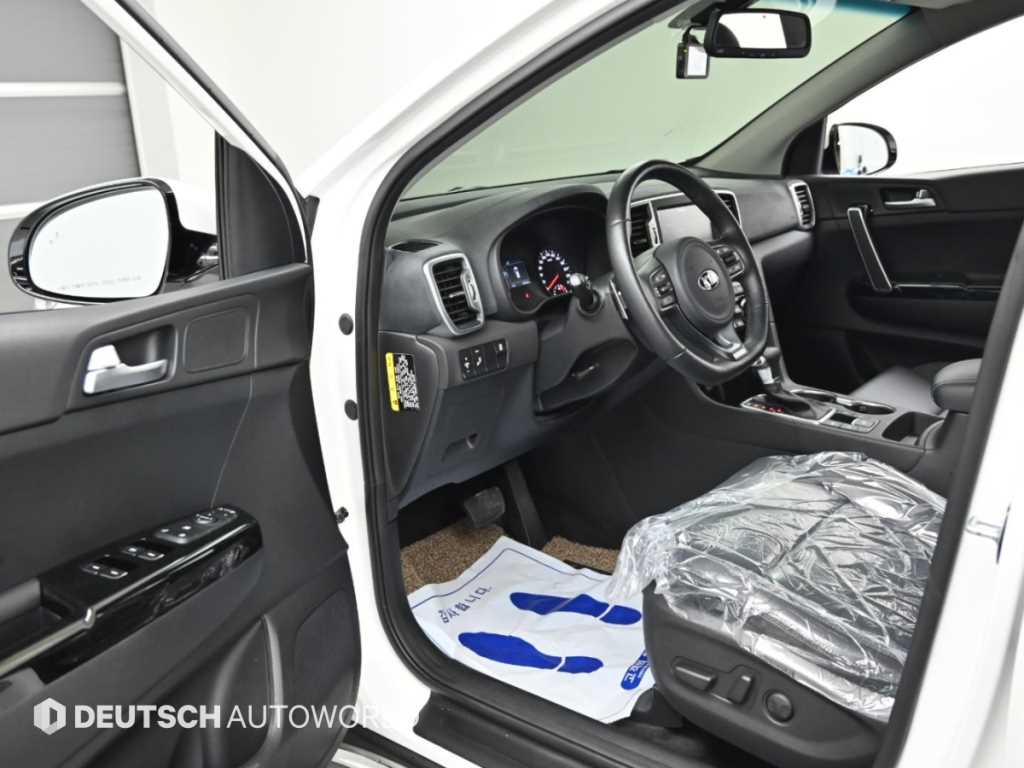 Kia Sportage — photo 11