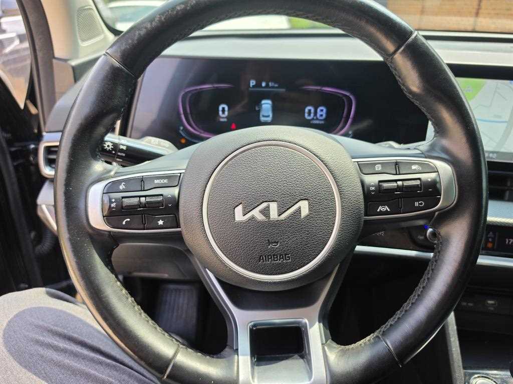 Kia Sportage — photo 12