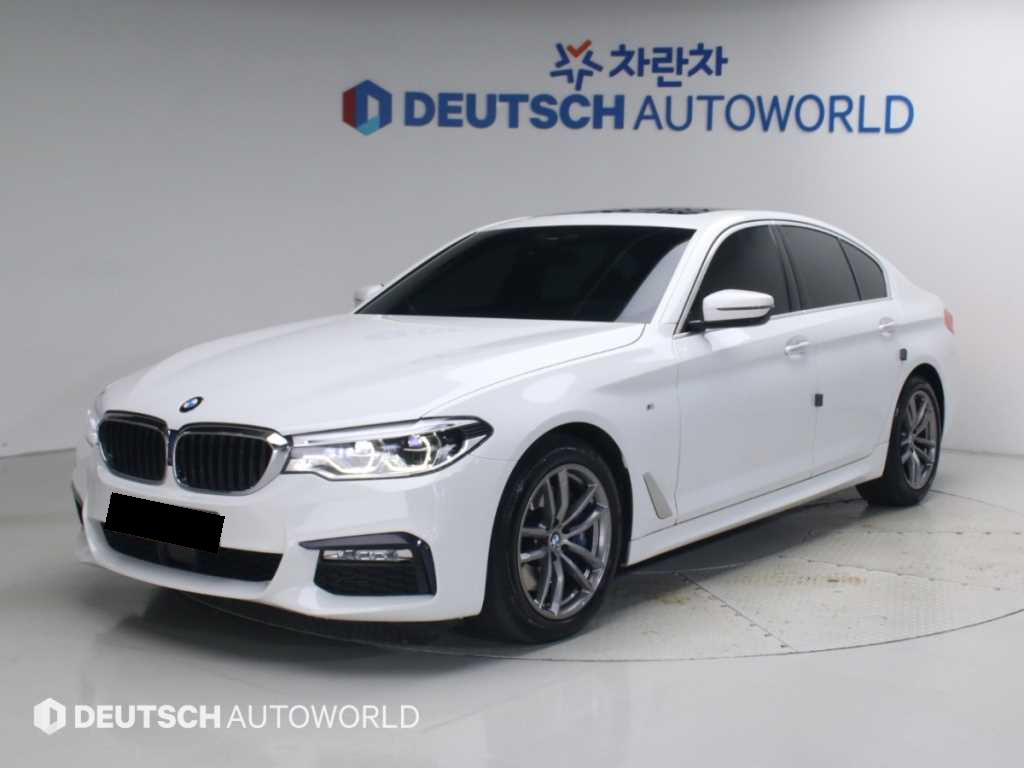 BMW 5-Series — photo 01