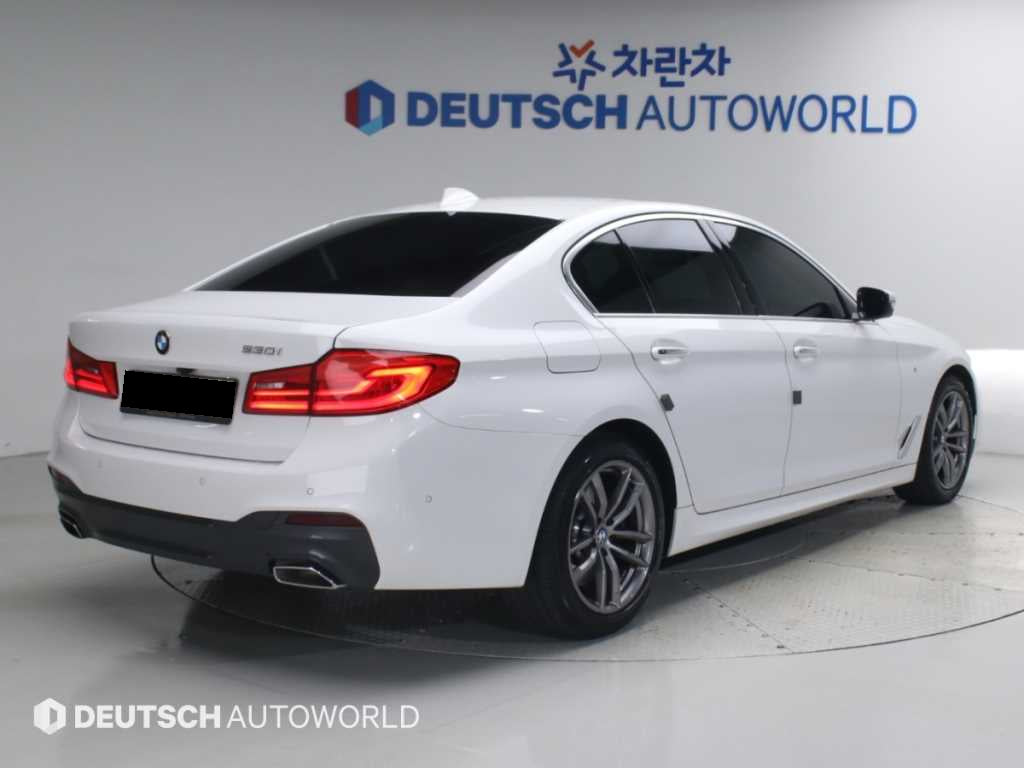 BMW 5-Series — photo 02
