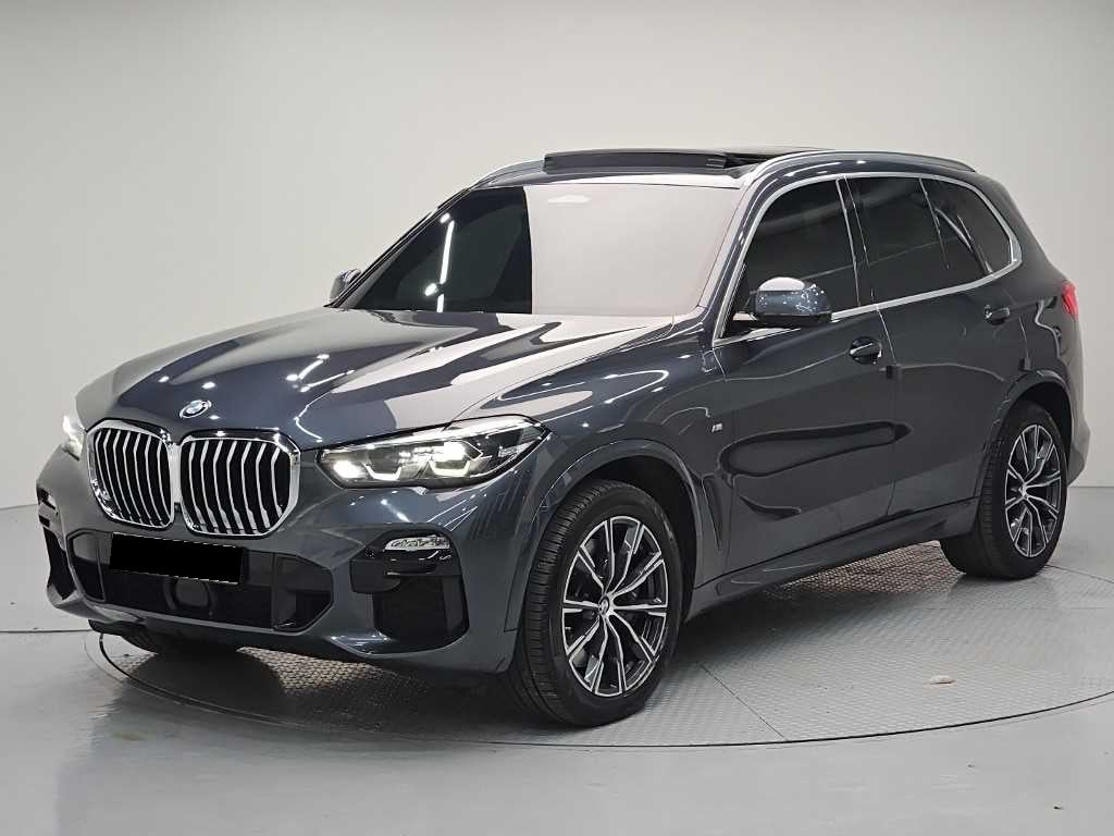 BMW X5 — photo 01