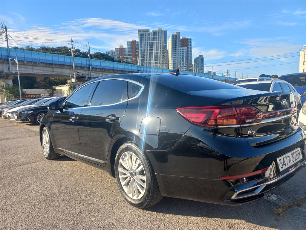 Kia K7 — photo 11