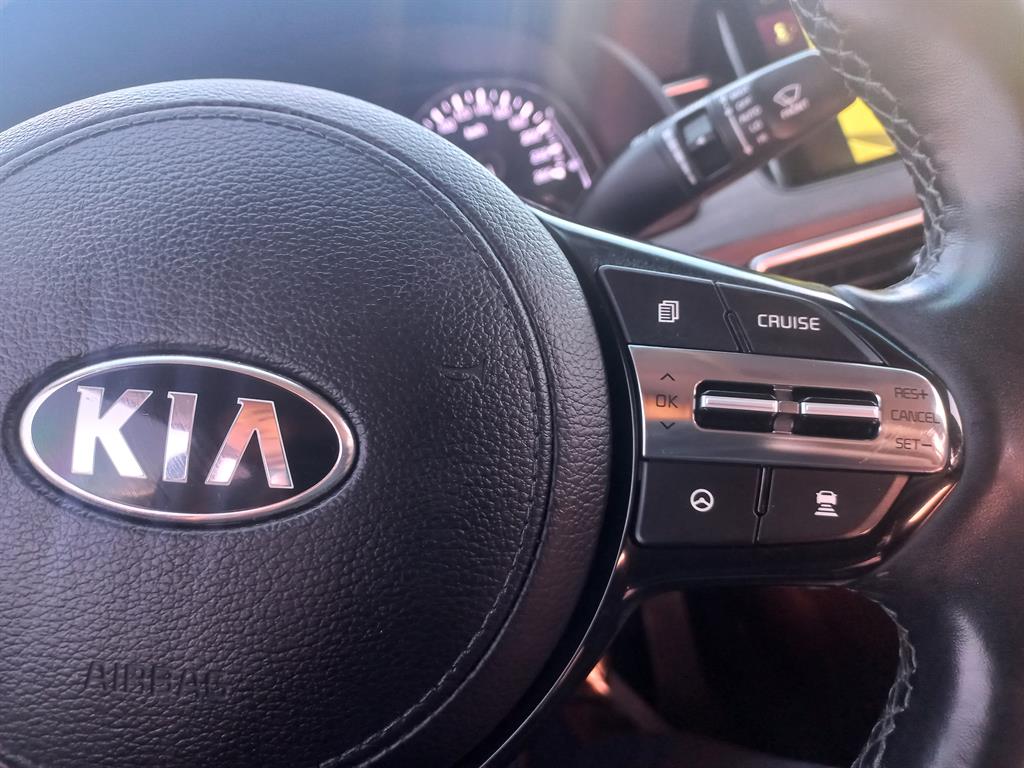 Kia K7 — photo 17