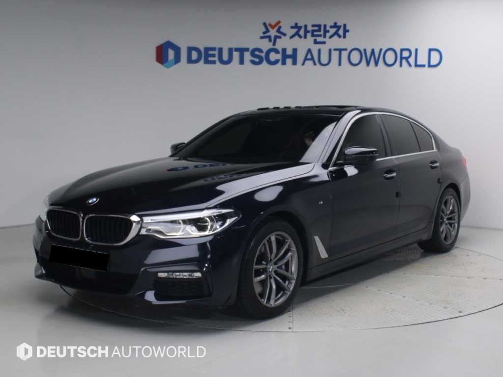 BMW 5-Series — photo 01