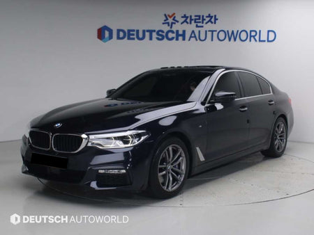 BMW 5-Series — photo 01