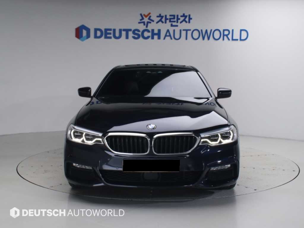 BMW 5-Series — photo 03