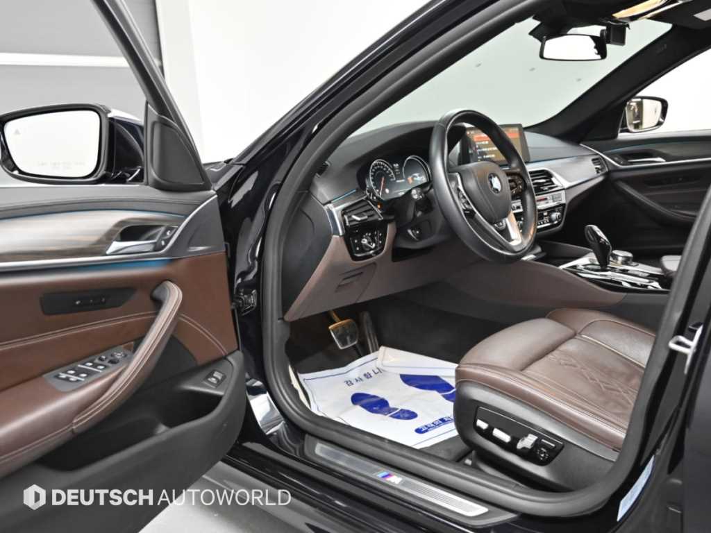 BMW 5-Series — photo 10
