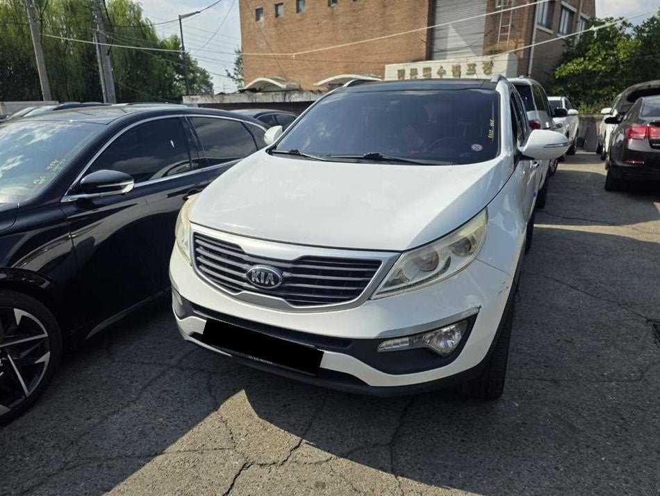Kia Sportage — photo 01
