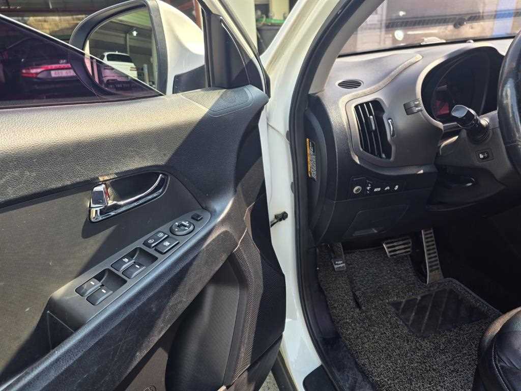 Kia Sportage — photo 10