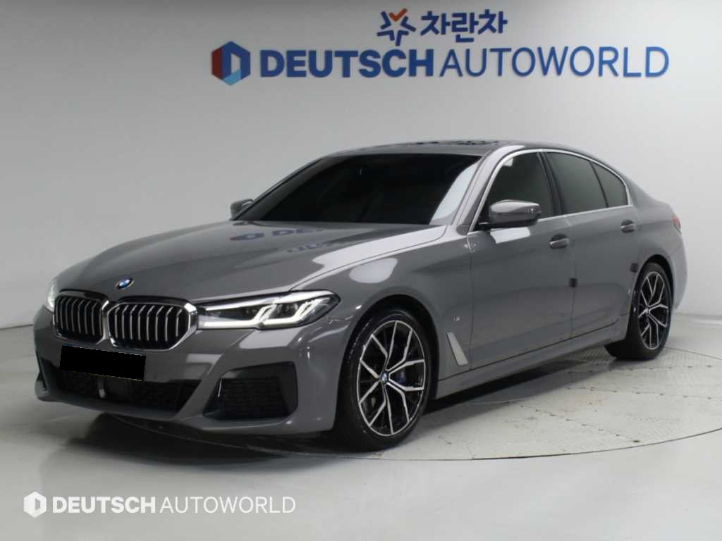 BMW 5-Series — photo 01