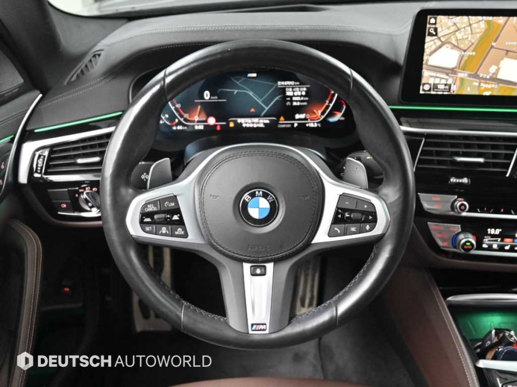 BMW 5-Series — photo 13