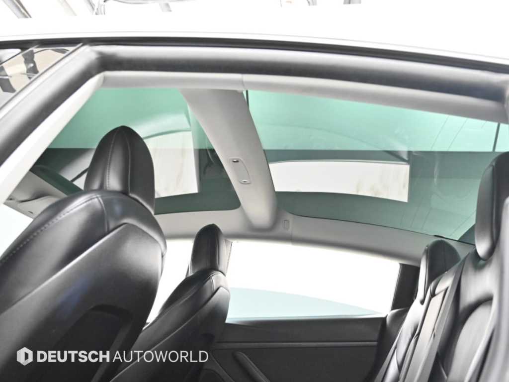Tesla Model 3 — photo 18