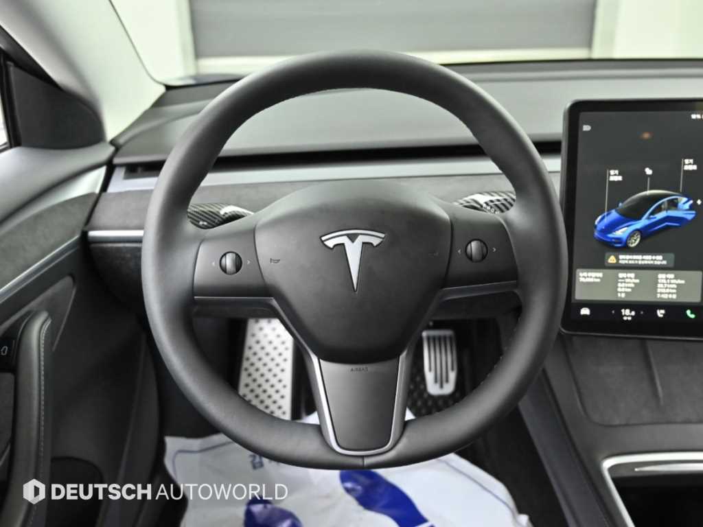 Tesla Model 3 — photo 13