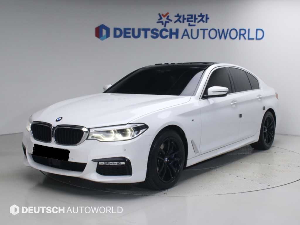 BMW 5-Series — photo 01