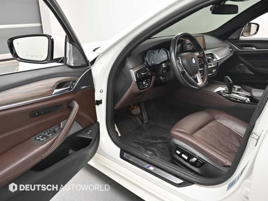 BMW 5-Series — photo 11