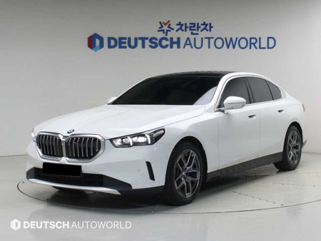 BMW 5-Series — photo 01