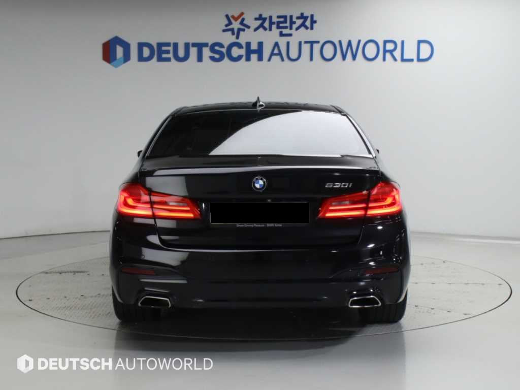 BMW 5-Series — photo 04