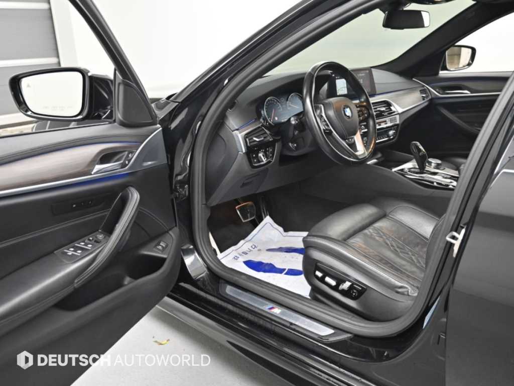 BMW 5-Series — photo 10