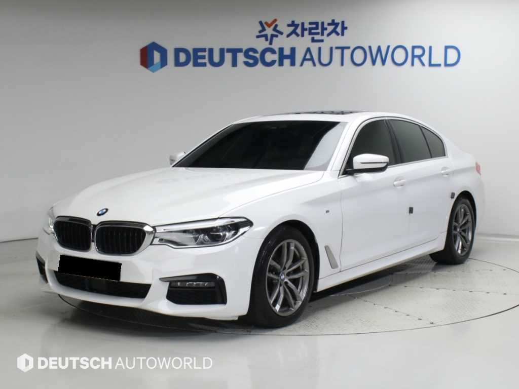 BMW 5-Series — photo 01