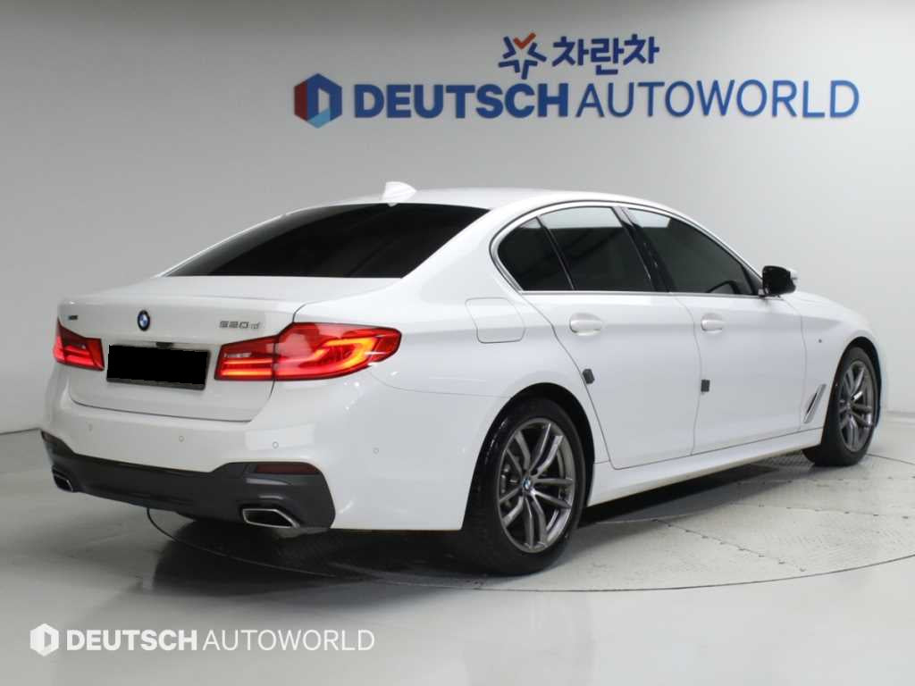 BMW 5-Series — photo 02