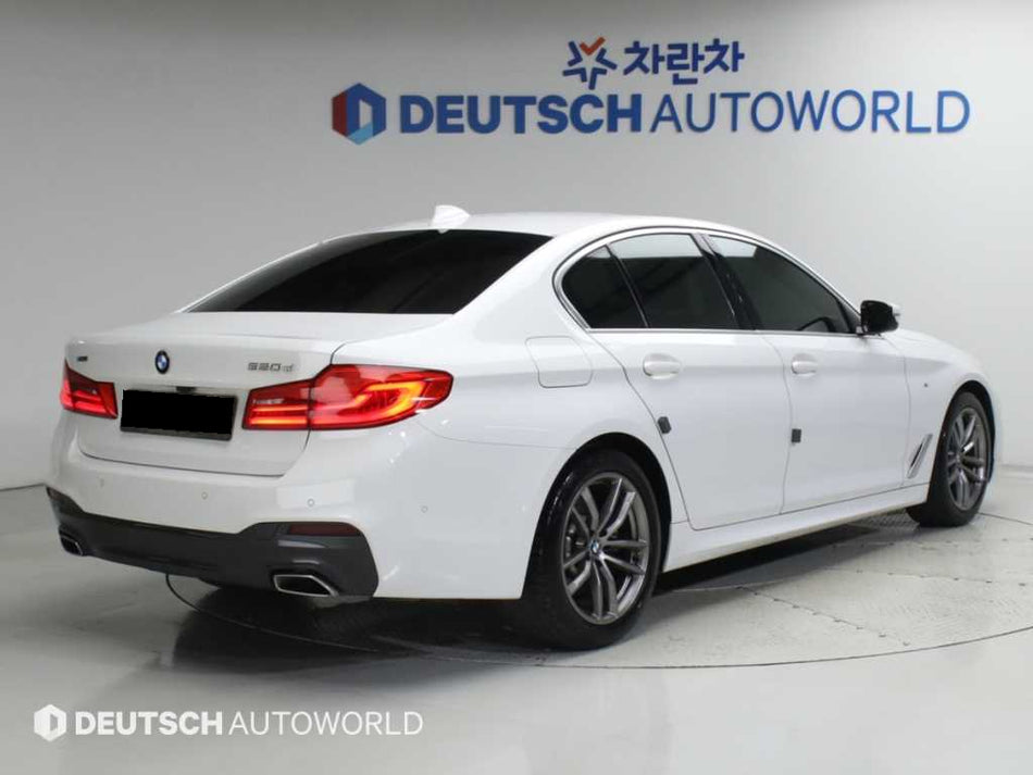BMW 5-Series — photo 02