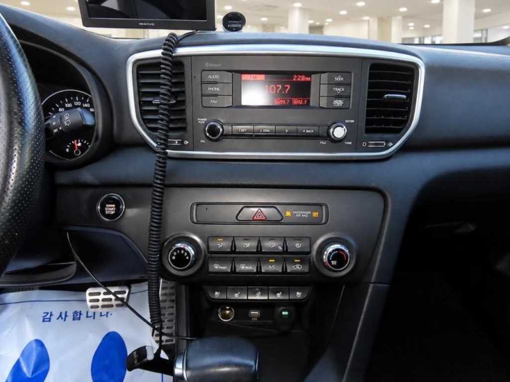 Kia Sportage — photo 13