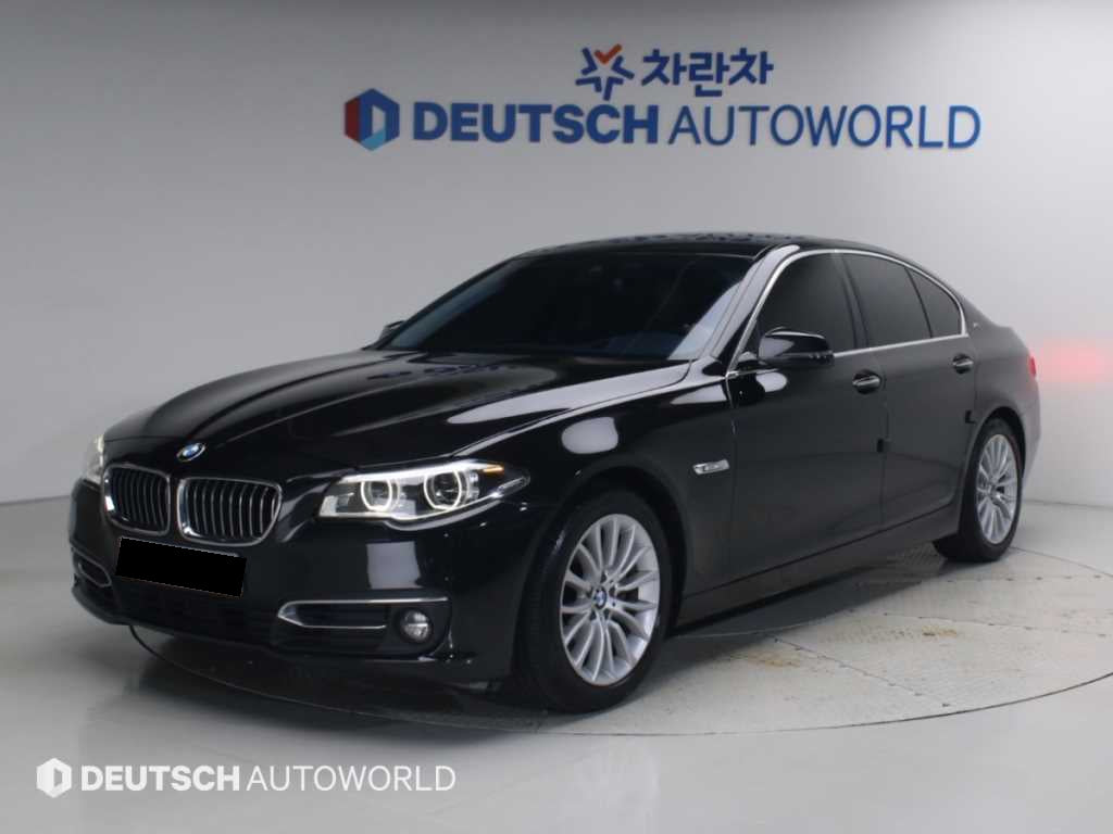 BMW 5-Series — photo 01