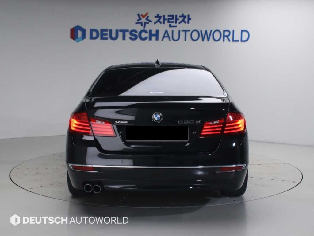 BMW 5-Series — photo 04