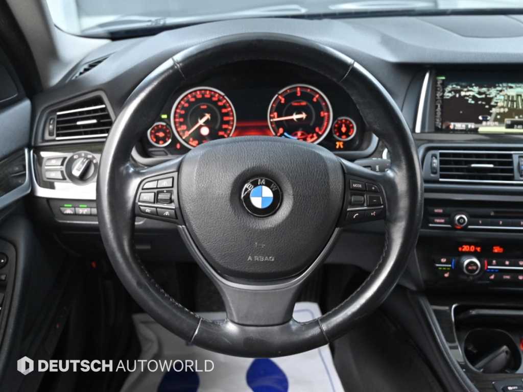 BMW 5-Series — photo 13