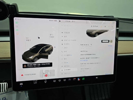 Tesla Model 3 — photo 18