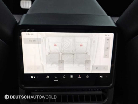 Tesla Model Y — photo 16